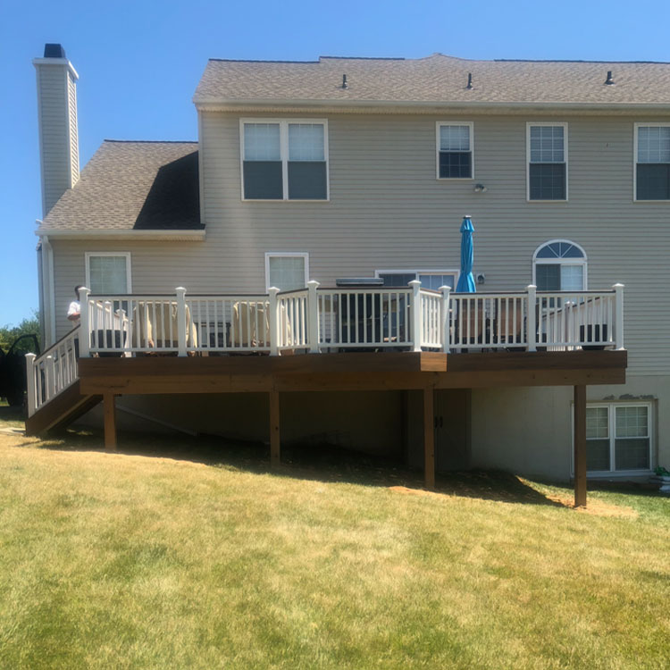 Classic wood deck with stairs and railing